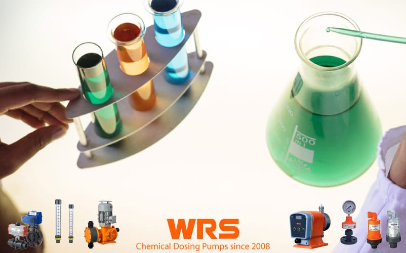 chemical dosing laboratory technician examining interaction of chemical compounds